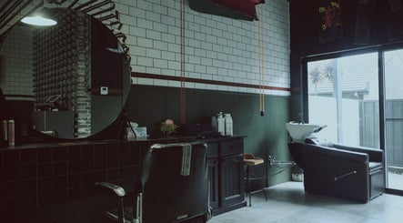 Elegant salon interior with mirror and chair at 36th Chamber, Gungahlin, Australian Capital Territory, AU.