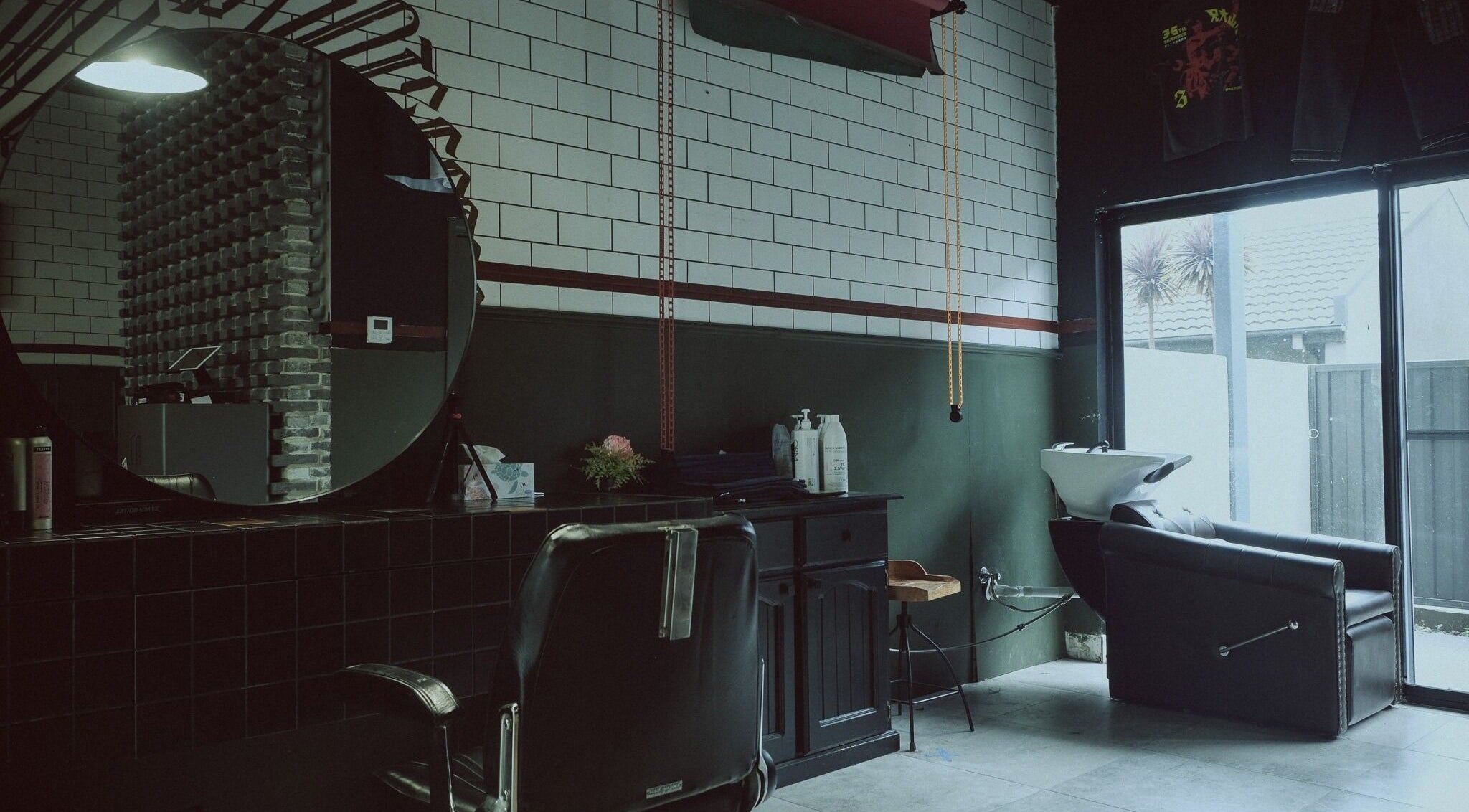 Elegant salon interior with mirror and chair at 36th Chamber, Gungahlin, Australian Capital Territory, AU.
