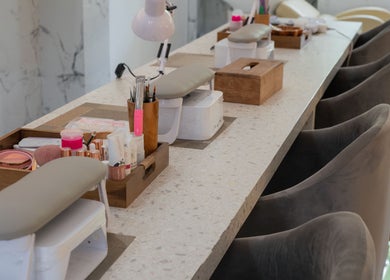 Elegant nail station at Anatolly Beauty Salon in Bali, Bali, ID with manicure tools and comfy seating.