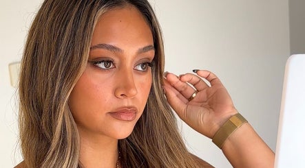 A woman with flawless makeup at Glos Skin & Beauty, Helensvale, Queensland, AU.