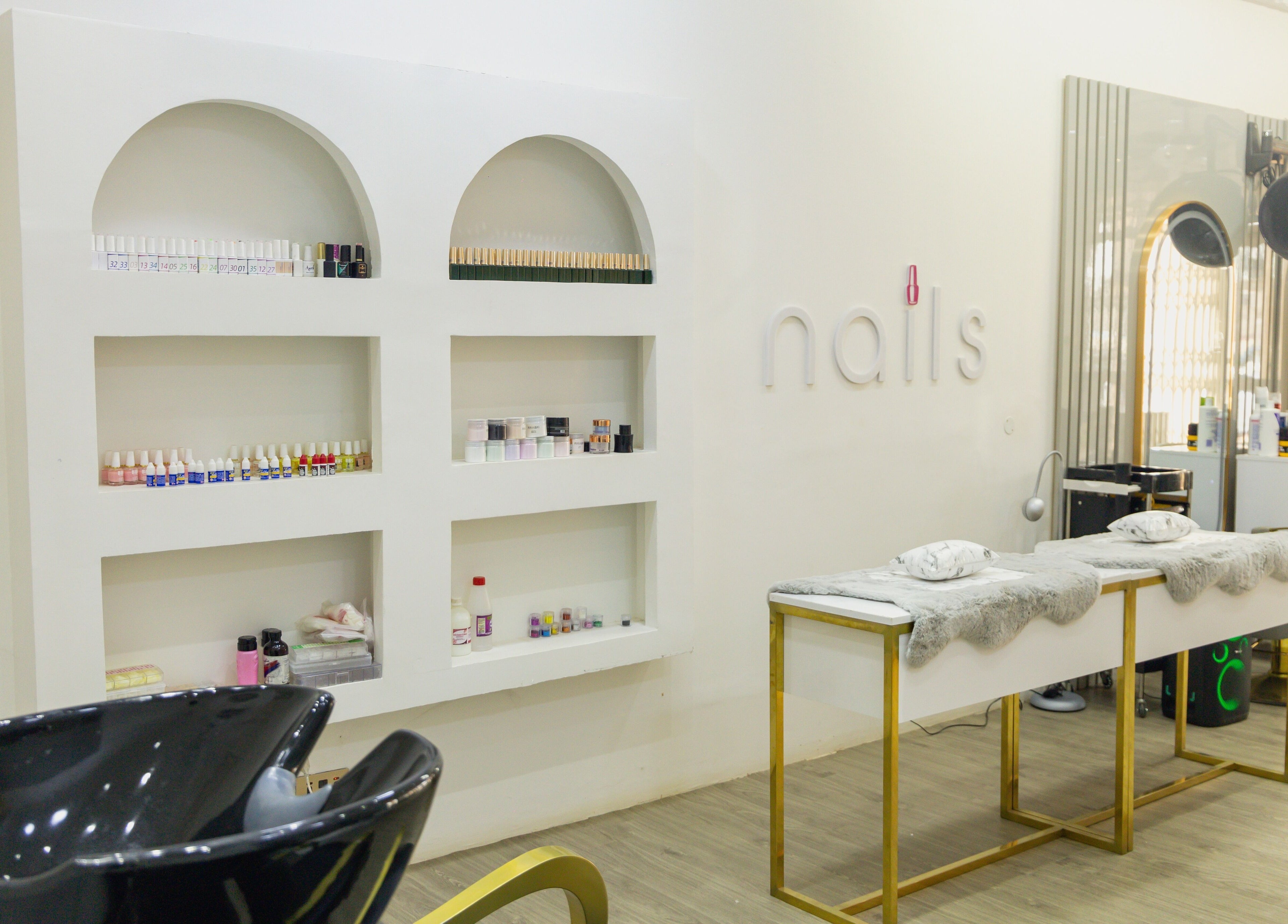 Nail care area at Styeeze Spa and Health Club, Greater Accra Region, GH, showcasing modern decor and services.