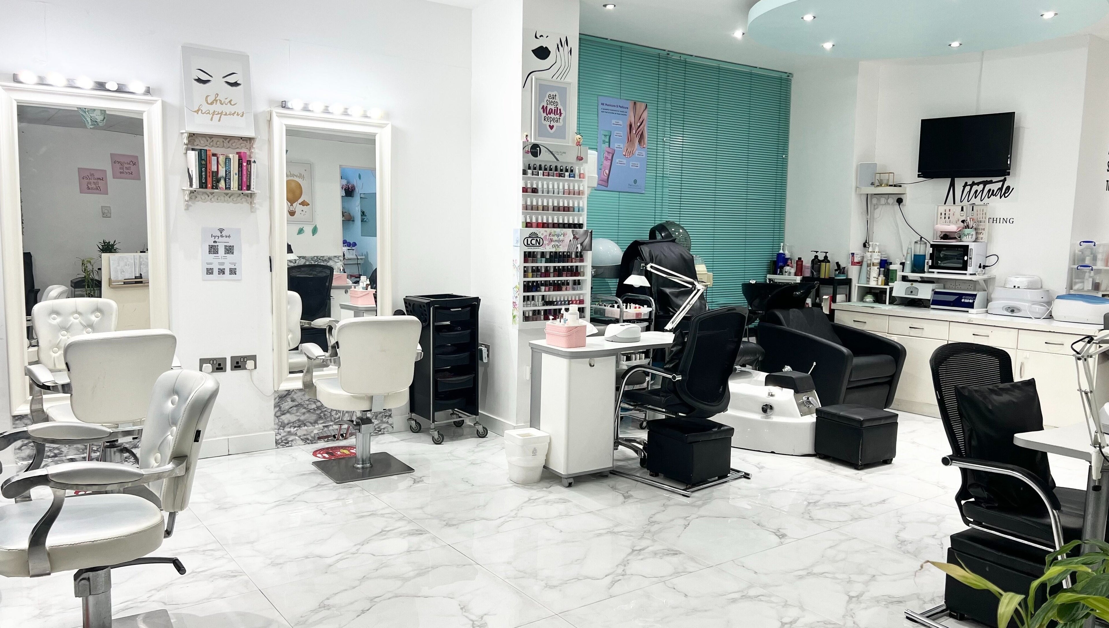 Chic interior of Winter Beauty Salon And Spa, Abu Dhabi, AE, featuring modern salon chairs and manicure stations.