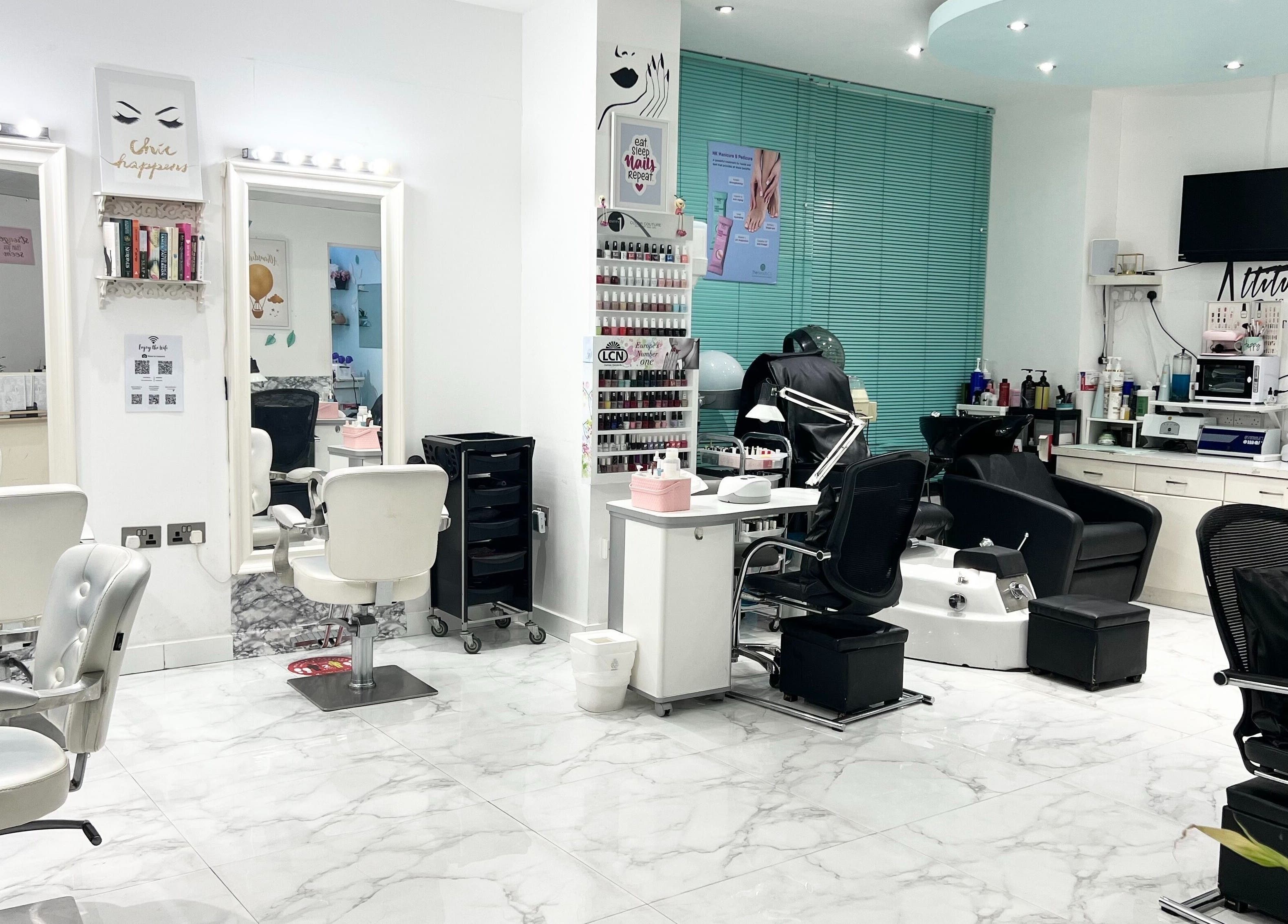 Chic interior of Winter Beauty Salon And Spa, Abu Dhabi, AE, featuring modern salon chairs and manicure stations.