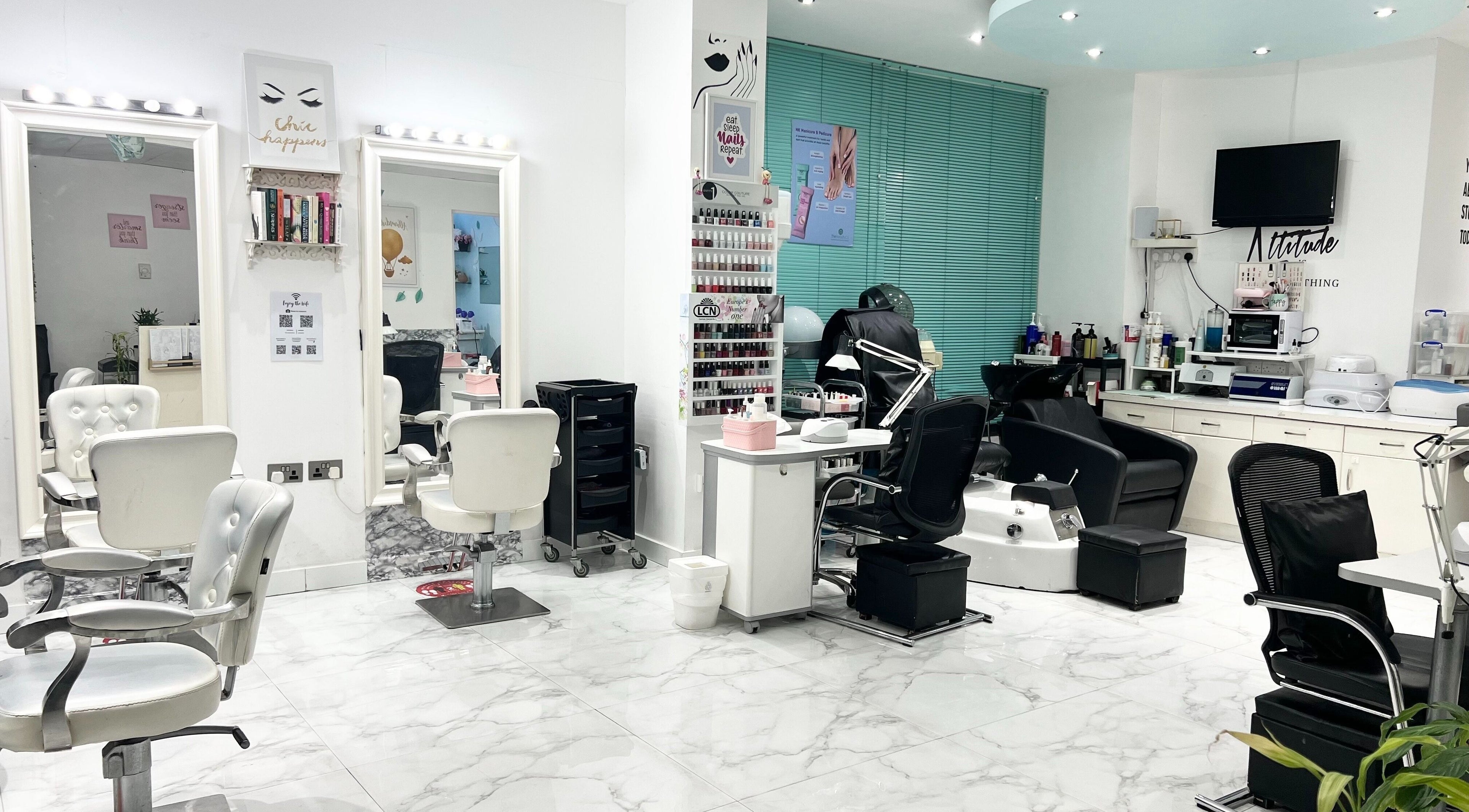 Chic interior of Winter Beauty Salon And Spa, Abu Dhabi, AE, featuring modern salon chairs and manicure stations.