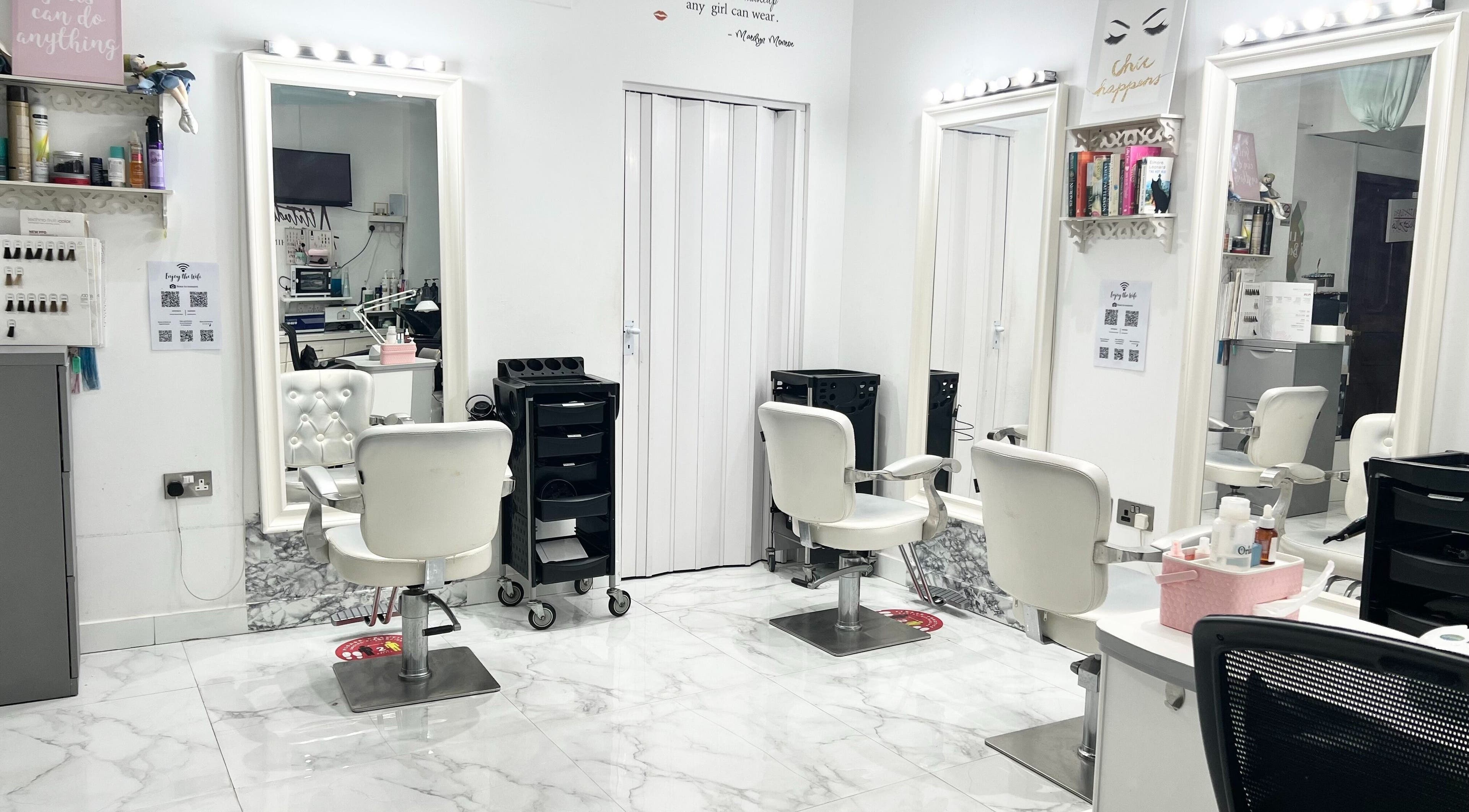 Modern salon chairs and mirrors at Winter Beauty Salon And Spa, Abu Dhabi, Abu Dhabi, AE.