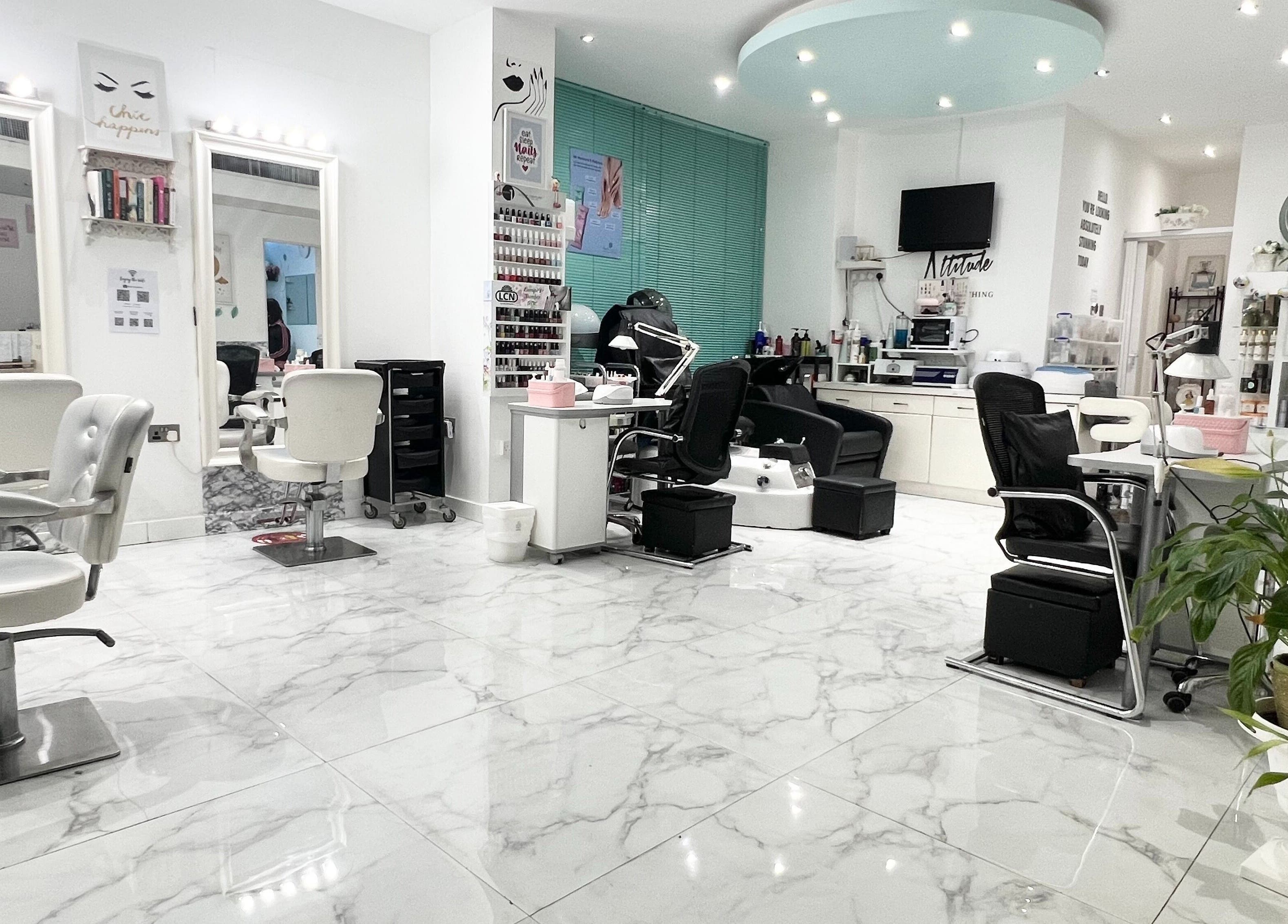 Elegant interior of Winter Beauty Salon And Spa in Abu Dhabi, featuring modern spa chairs and decor.