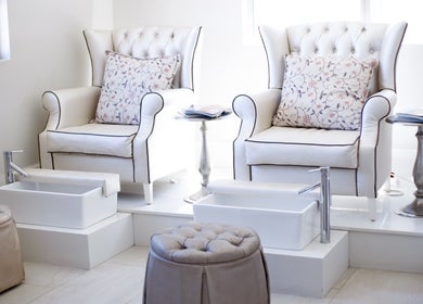 Elegant pedicure chairs at Mint Salon, Johannesburg, Gauteng, ZA, offering a serene beauty experience.