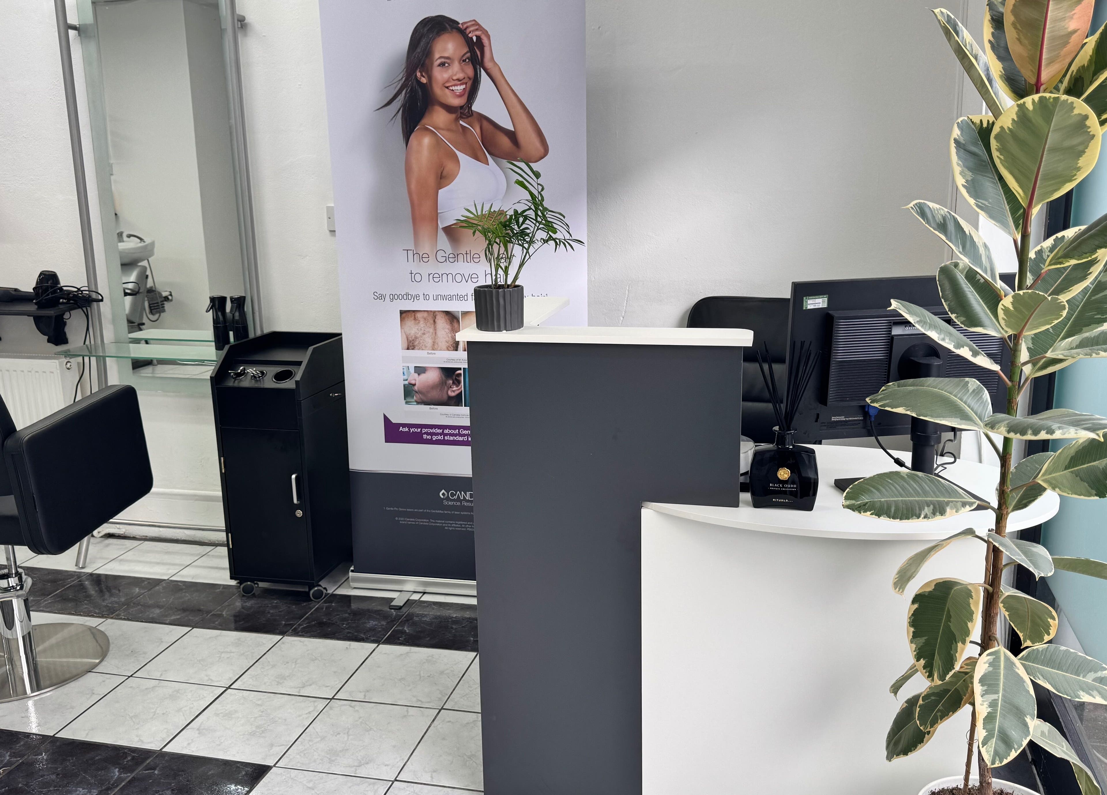 Modern salon interior at Ruby’s Hair Skin & Laser, London, England, GB with sleek chair and elegant decor.