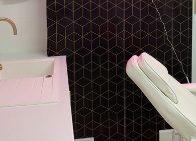 Modern treatment room at Harley Beauty Aesthetic Clinic in Ilford, England, GB with a chic design.