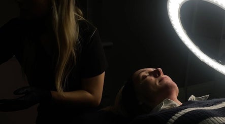 Client receiving facial treatment at Sofia’s Skin Space, Louth, England, GB under soft lighting.