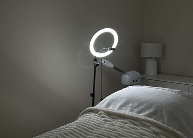 Tranquil treatment room at Sofia’s Skin Space, Louth, England, GB featuring cozy blanket and ambient lighting.