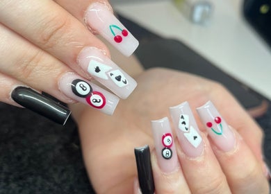 Elegant poker-themed nail art at Byellwhite in Blackpool, England, GB, showcasing creativity in nail design.