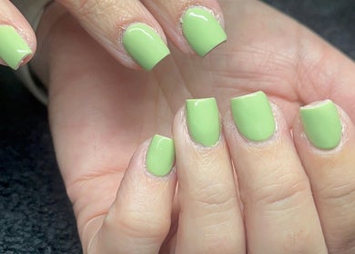 Bright green manicure at Byellwhite in Blackpool, England, GB, showcasing expert nail art.