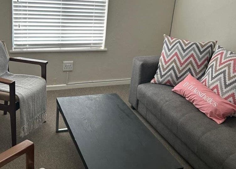 Cozy seating area at Permanent Make-Up by Prawlene, Cape Town, Western Cape, ZA featuring stylish decor.