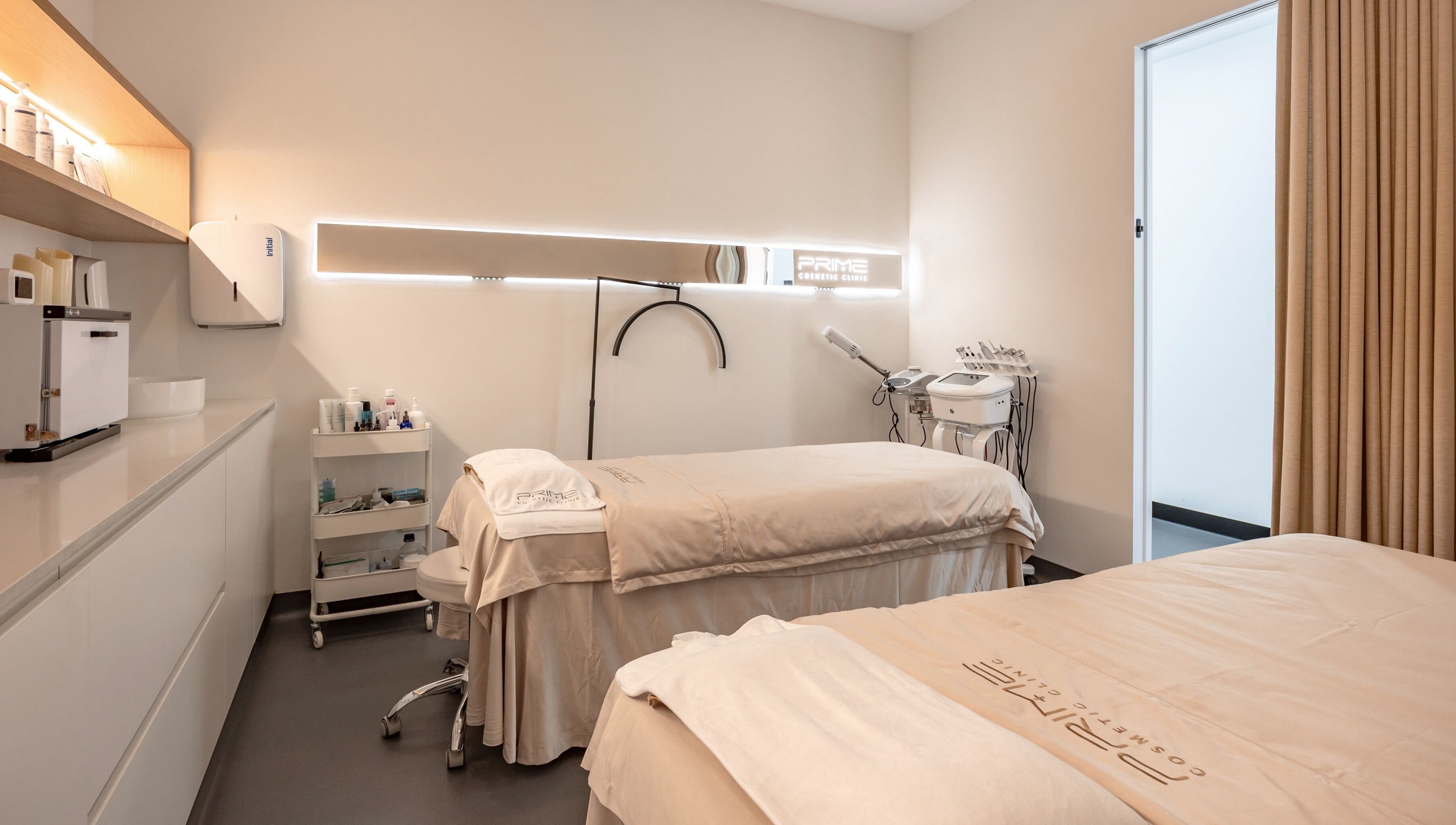 Luxurious treatment room at Prime Cosmetic Clinic in Camberwell, Victoria, AU featuring modern therapy beds.