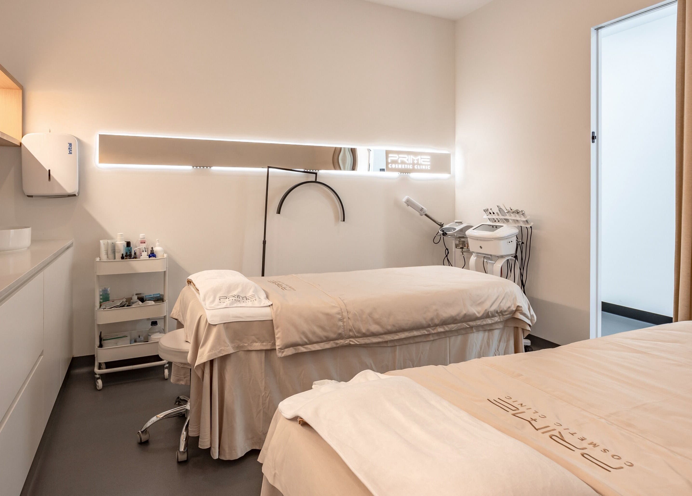 Luxurious treatment room at Prime Cosmetic Clinic in Camberwell, Victoria, AU featuring modern therapy beds.