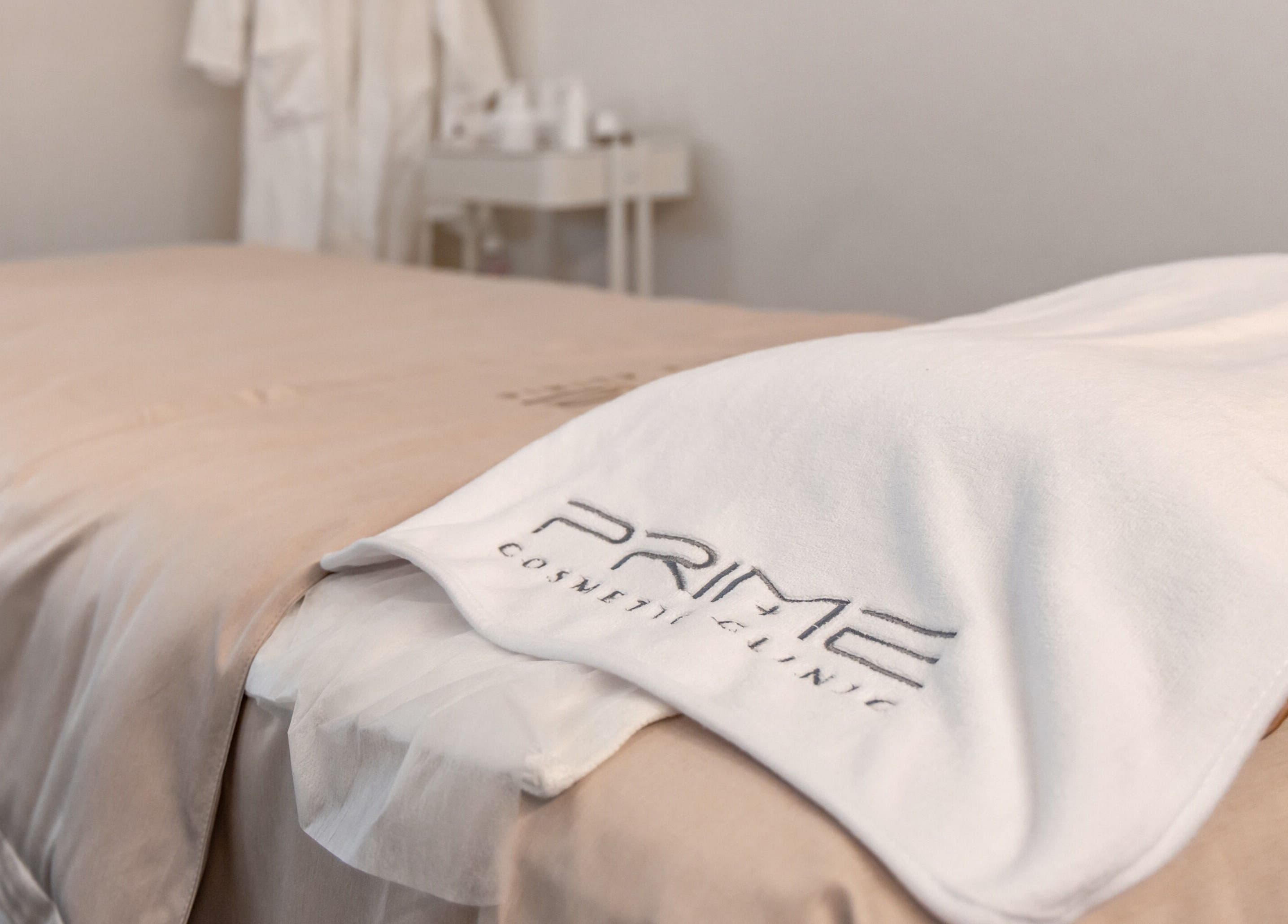 Plush treatment bed at Prime Cosmetic Clinic - Melbourne, located in Camberwell, Victoria, AU.