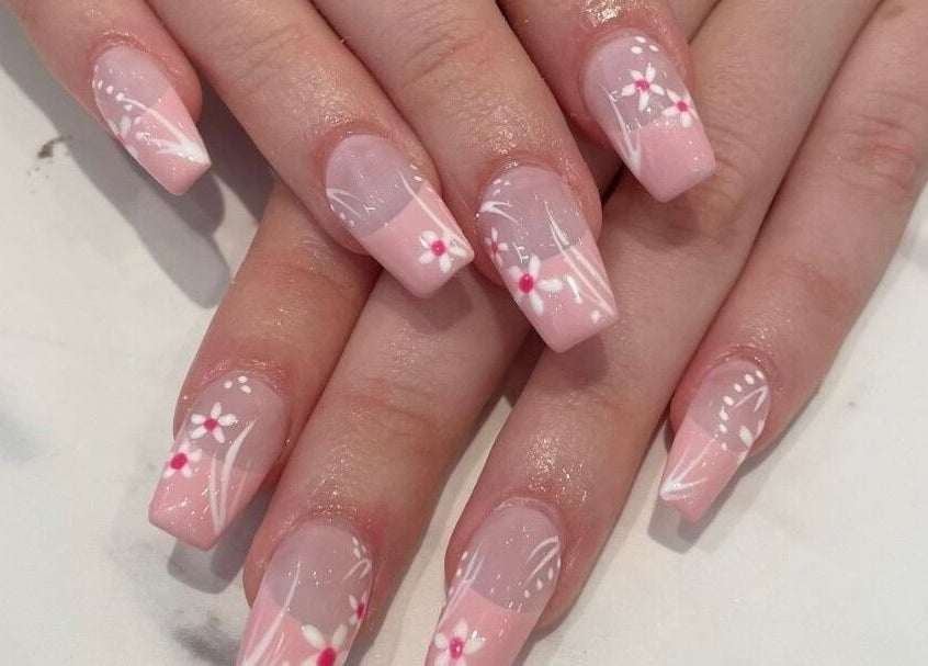 Chic floral nail art at Polished Perfect Nanaimo, Nanaimo, British Columbia, CA. Elegant and detailed design.