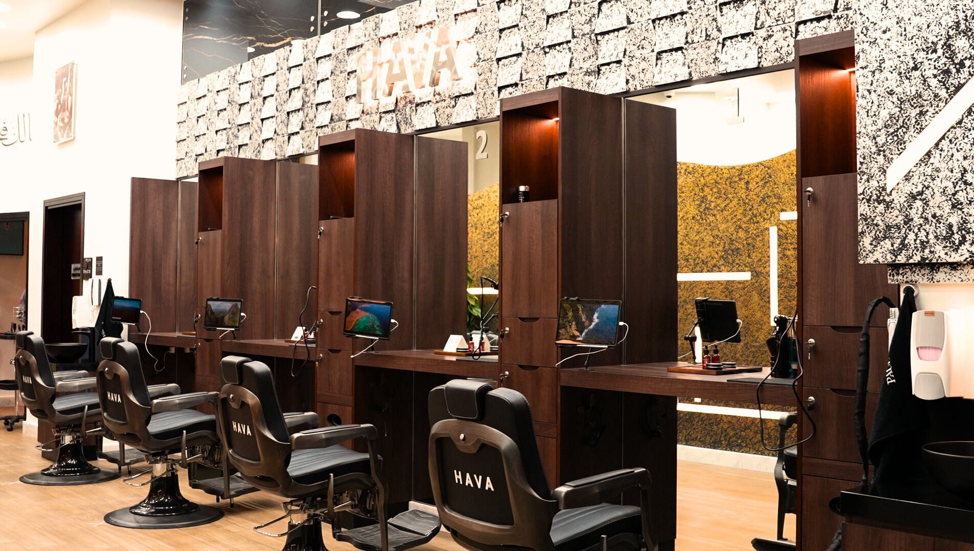Modern interiors of Hava Gents Salon Ajman khalifa St featuring sleek barber chairs, Ajman, Ajman, AE.