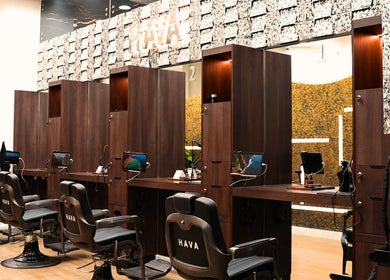 Modern interiors of Hava Gents Salon Ajman khalifa St featuring sleek barber chairs, Ajman, Ajman, AE.