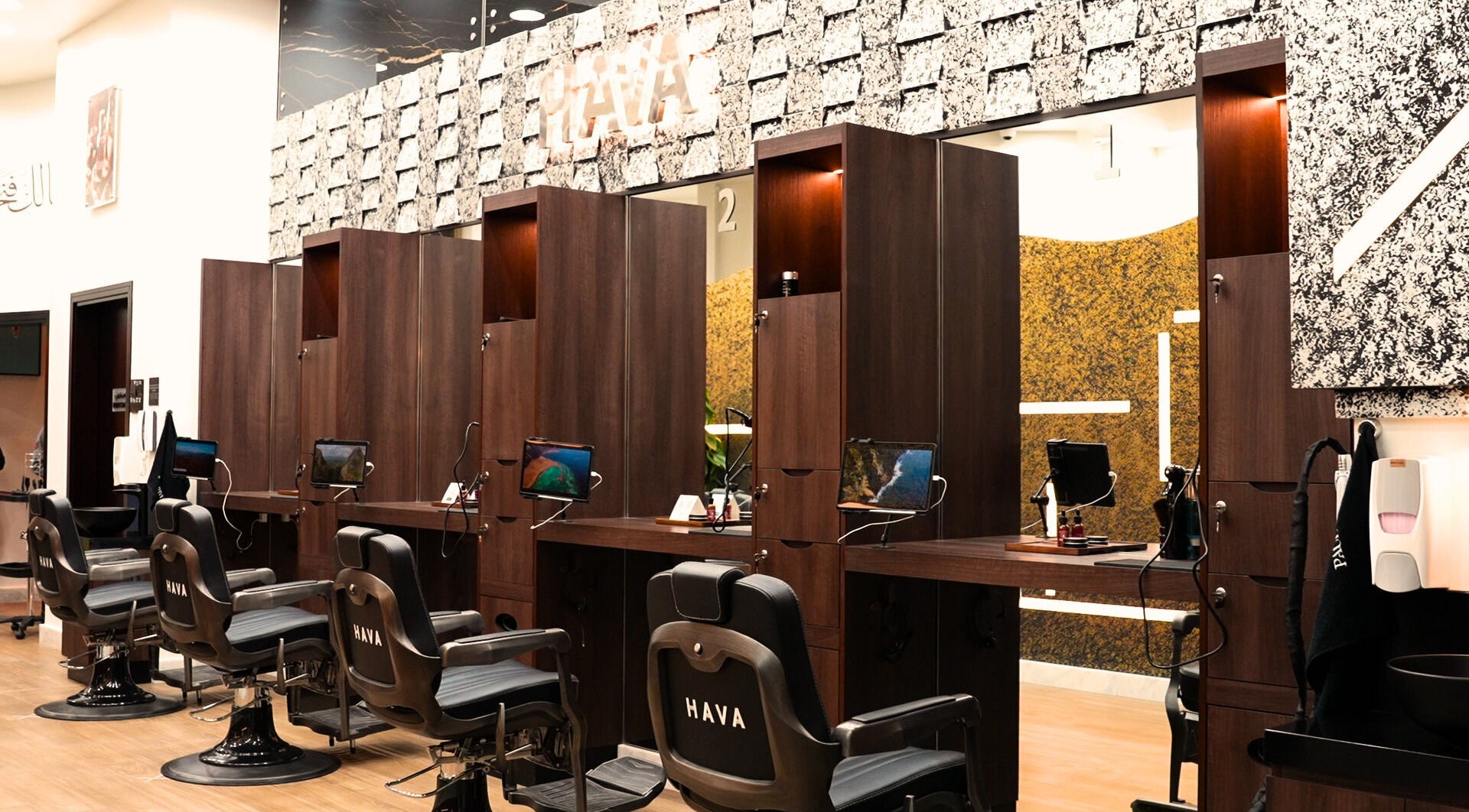 Modern interiors of Hava Gents Salon Ajman khalifa St featuring sleek barber chairs, Ajman, Ajman, AE.