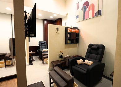 Relaxing seating at Hava Gents Salon Ajman khalifa St, Ajman, Ajman, AE featuring comfortable chairs.