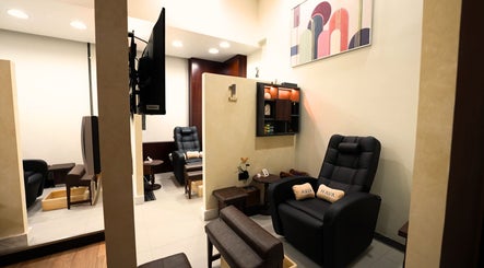 Relaxing seating at Hava Gents Salon Ajman khalifa St, Ajman, Ajman, AE featuring comfortable chairs.
