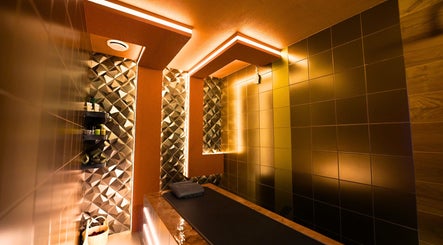 Luxurious treatment room at Hava Gents Salon Ajman khalifa St, Ajman, Ajman, AE with elegant lighting.