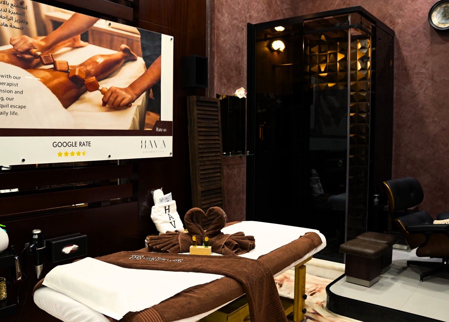 Massage room with treatment table at Hava Gents Salon Ajman khalifa St, Ajman, Ajman, AE.