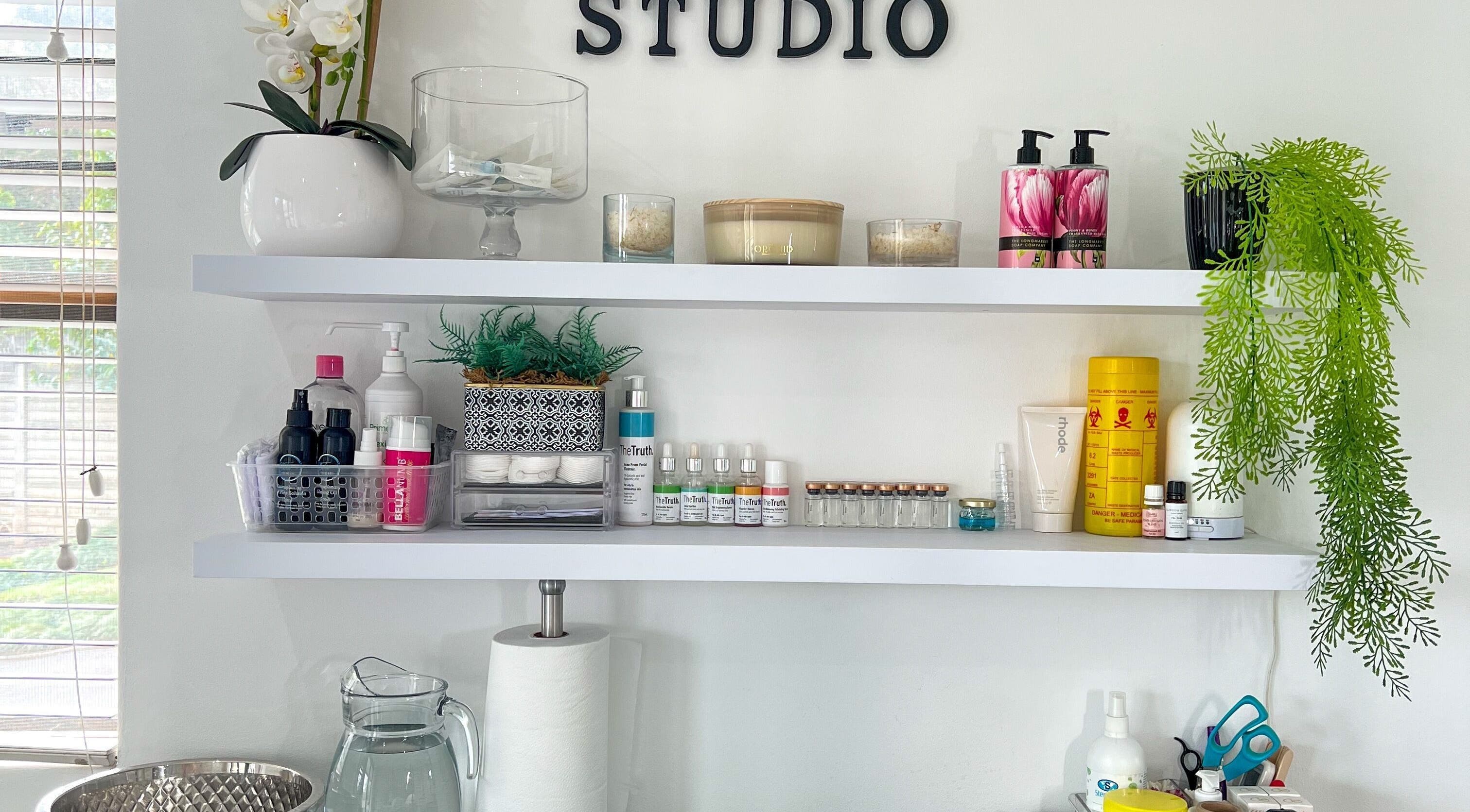 Shelves at AmyWilliams.Studio in Kloof, Kwazulu-natal, ZA with beauty products and decor.