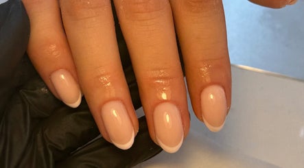 French manicure on nails by By Cerys Nails in Warrington, England, GB. Elegant and glossy finish.