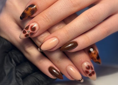 Elegant nail art design at By Cerys Nails, Warrington, England, GB showcasing intricate patterns and glossy finish.