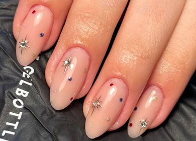 Elegant nail art with gemstones at By Cerys Nails, Warrington, England, GB.