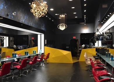 Air Plus Hair Salon at Metrotown features modern design in Burnaby, British Columbia, CA with vibrant decor and styling chairs.