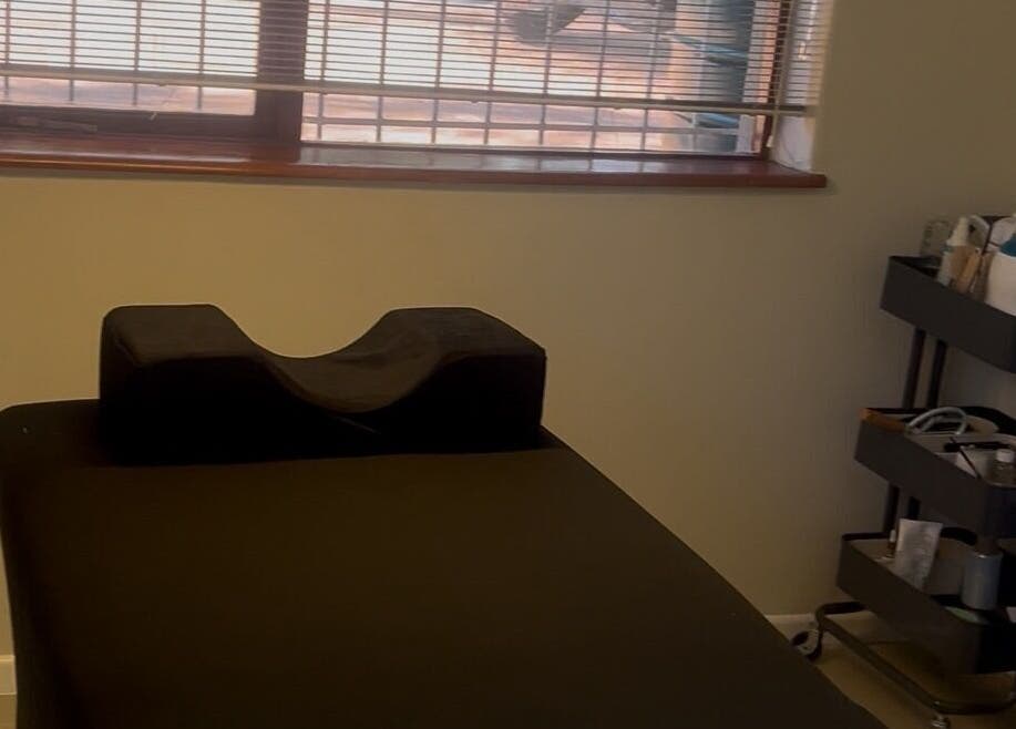 Relaxation room at Sage nail and beauty, Cape Town, Western Cape, ZA with treatment bed and equipment.