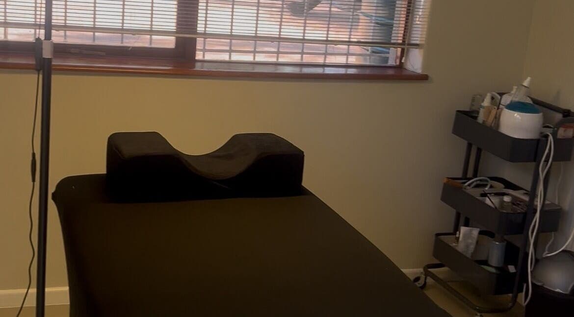 Relaxation room at Sage nail and beauty, Cape Town, Western Cape, ZA with treatment bed and equipment.