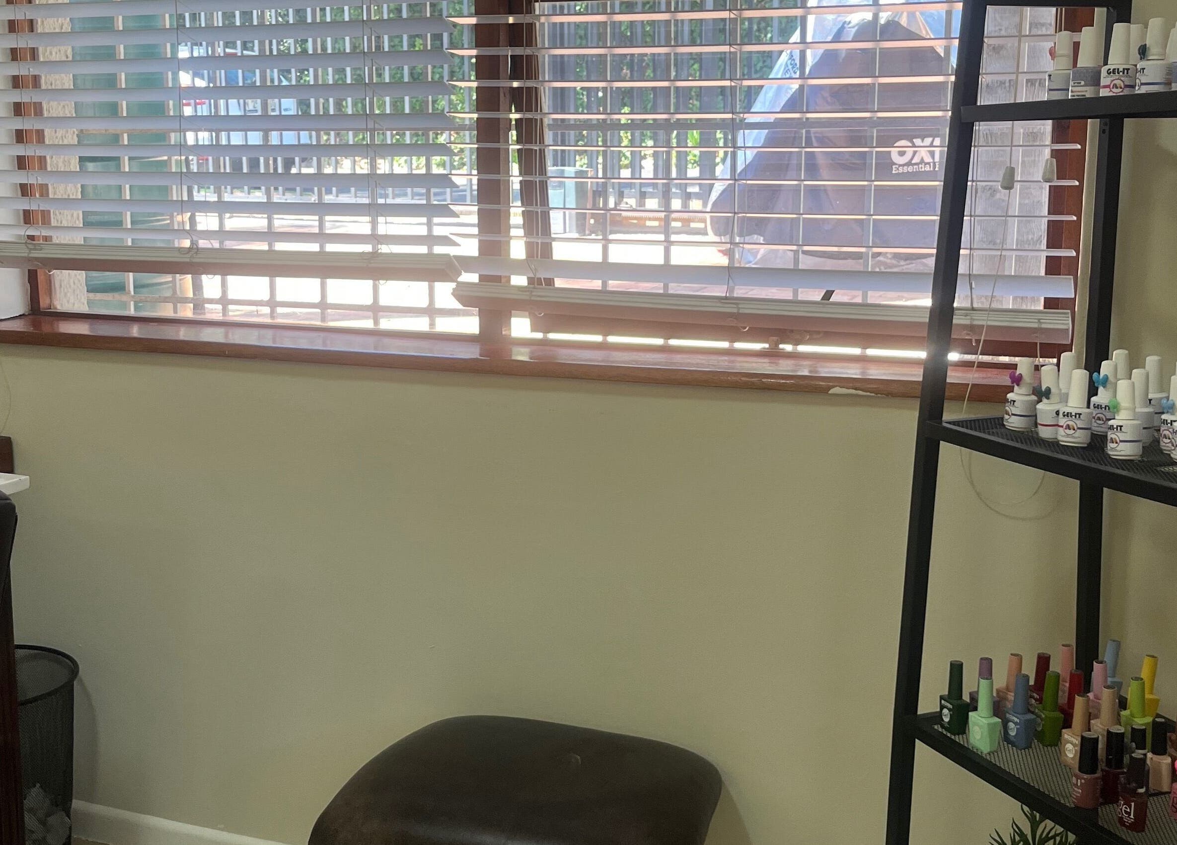 Sage nail and beauty in Cape Town, Western Cape, ZA features vibrant nail polish display.