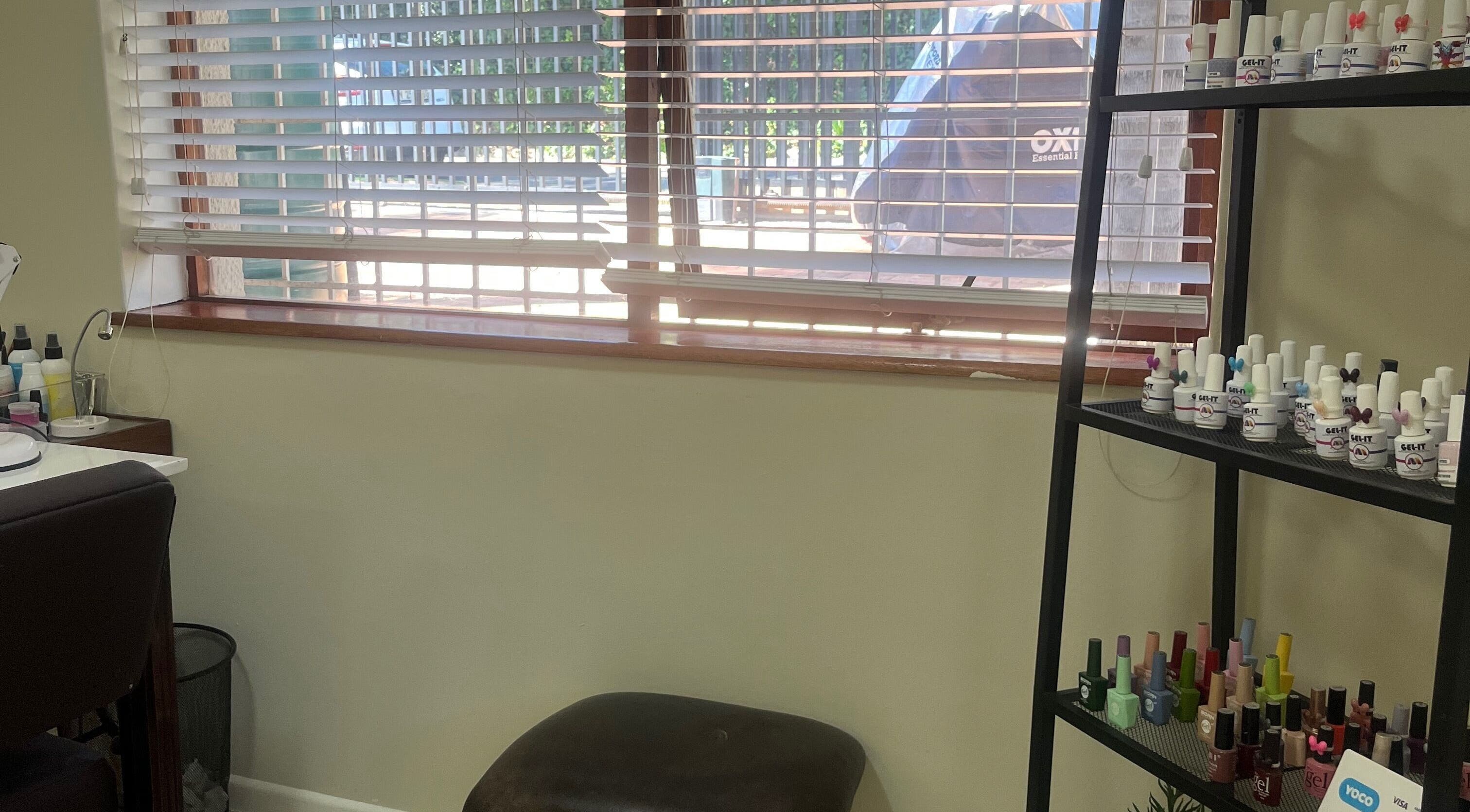 Sage nail and beauty in Cape Town, Western Cape, ZA features vibrant nail polish display.