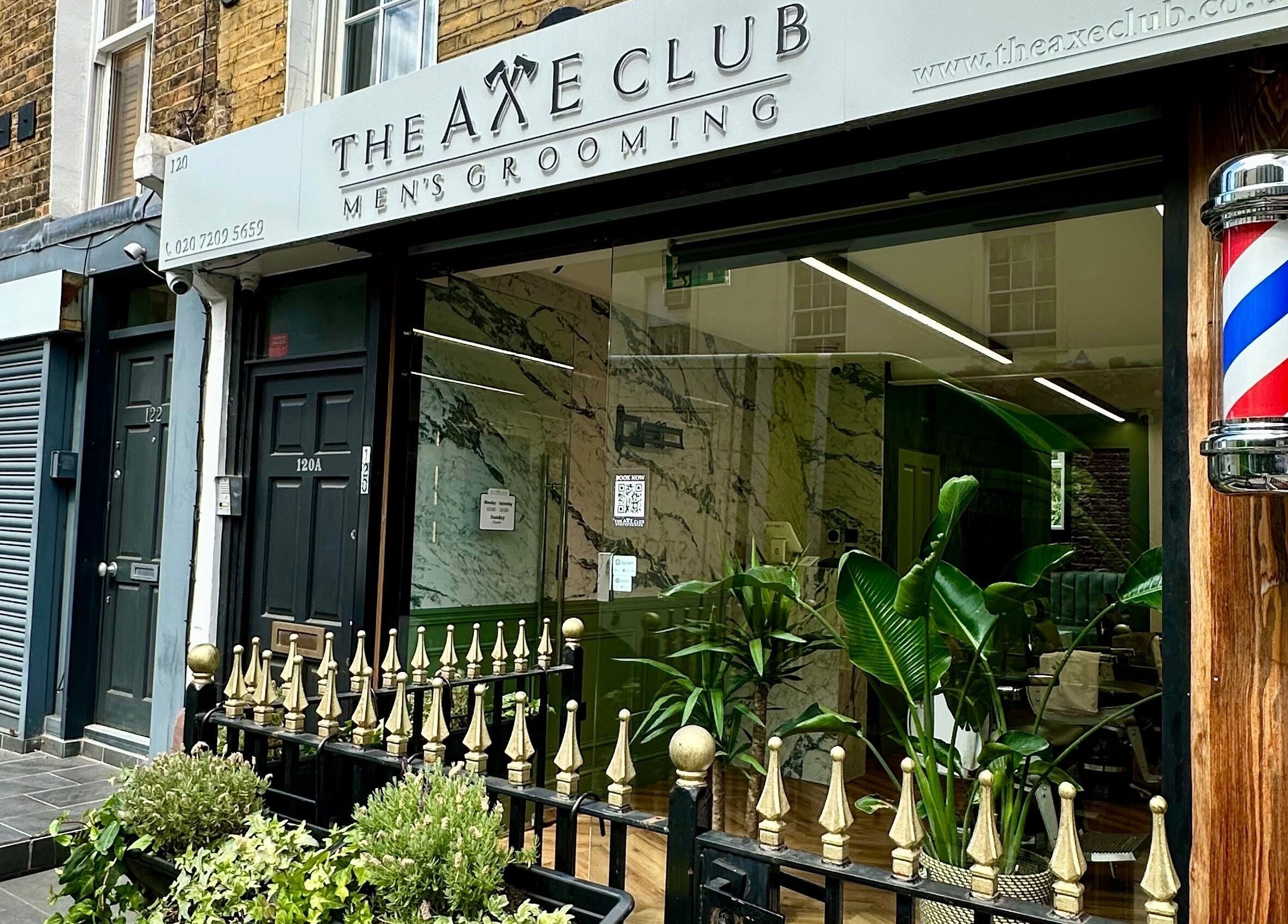 Front view of The Axe Club - Euston, a grooming venue in London, England, GB showcasing its stylish facade.