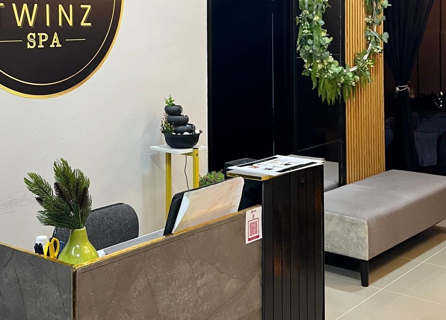Reception area at Twinz Spa, Rawang, Selangor, MY with elegant decor and a cozy ambiance.