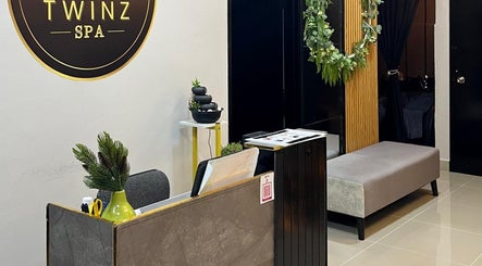 Reception area at Twinz Spa, Rawang, Selangor, MY with elegant decor and a cozy ambiance.