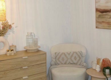 Cozy seating at Indi’s Lash Studio, Nirimba, Queensland, AU with a soft chair and calming decor.
