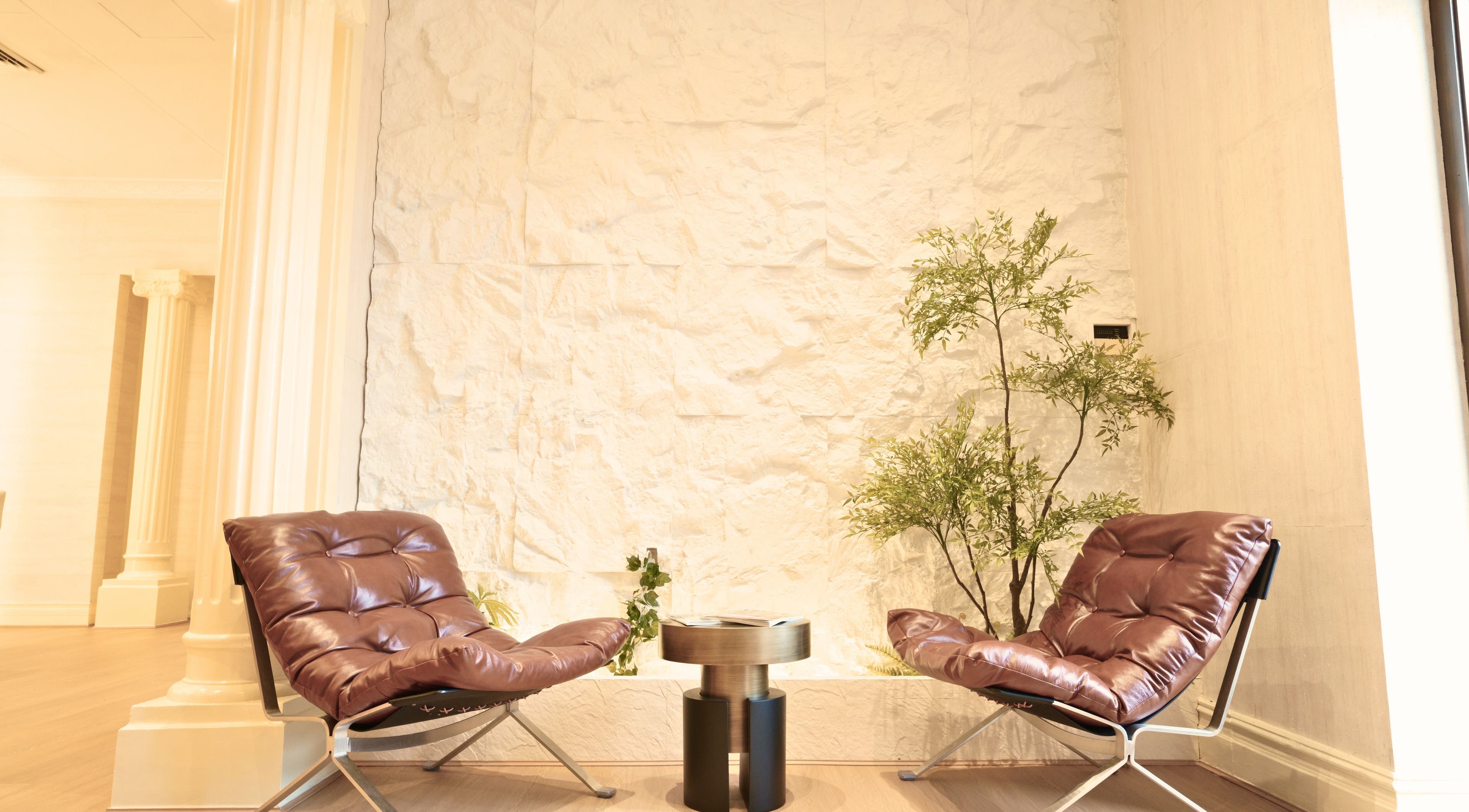Comfortable seating area at Soothe Massage & Day Spa, Nedlands, Western Australia, AU, featuring plush chairs.