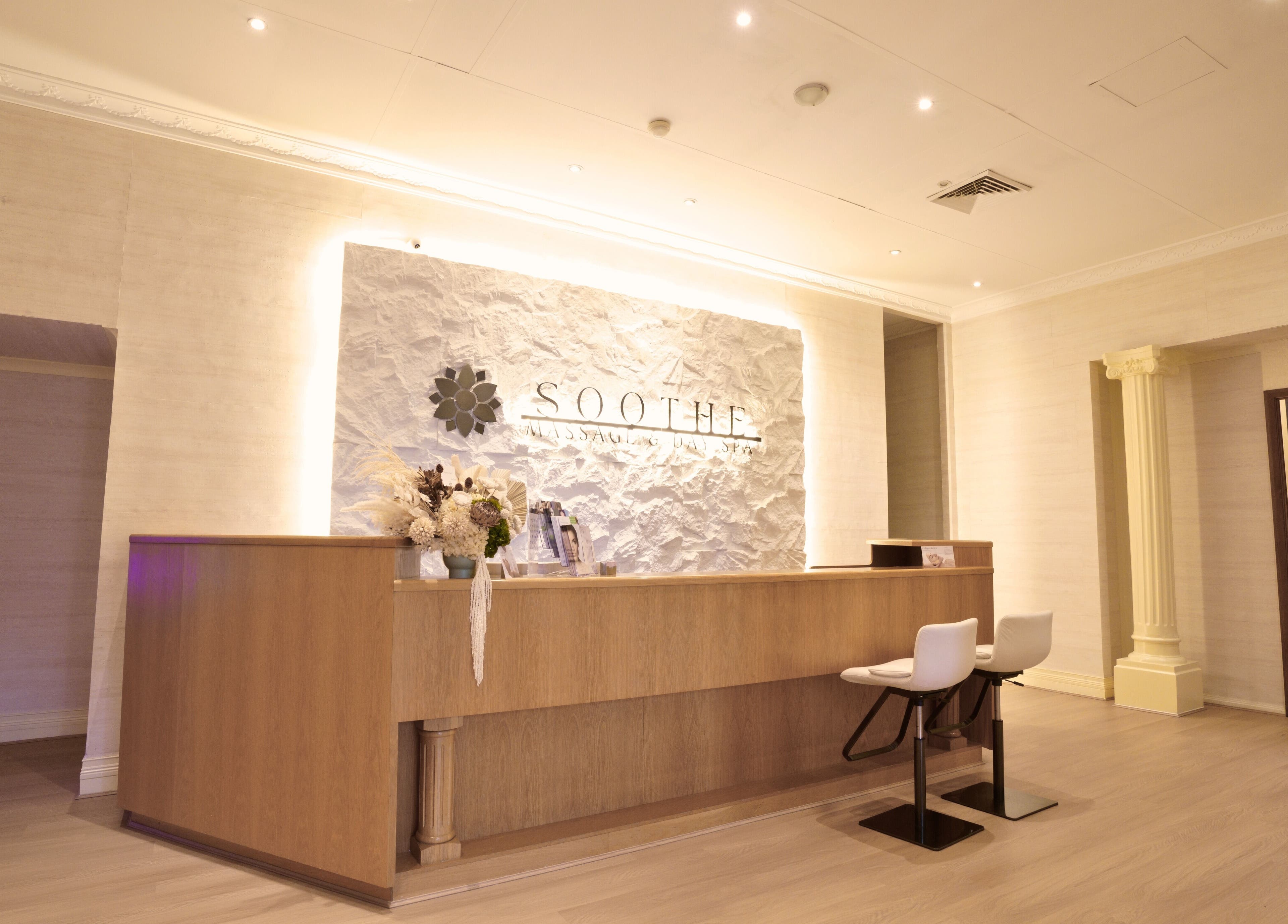 Reception area at Soothe Massage & Day Spa, Nedlands, Western Australia, AU with elegant decor and soft lighting.
