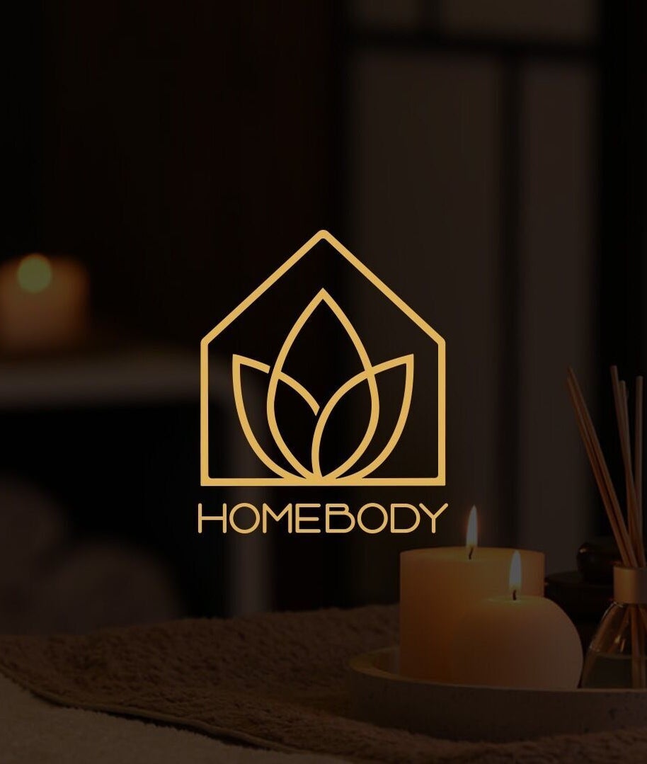 Homebody in Dubai features a tranquil setting with candles and aroma sticks, creating a relaxing ambiance.