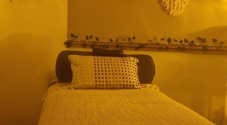Tranquil massage room with cozy bed at Inner Peace Pathways, Stoke-on-Trent, England, GB.