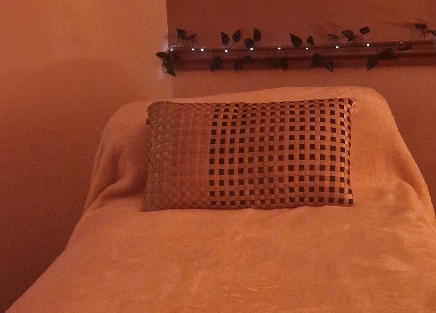 Relaxing massage bed at Inner Peace Pathways, Stoke-on-Trent, England, GB, with warm ambient lighting.