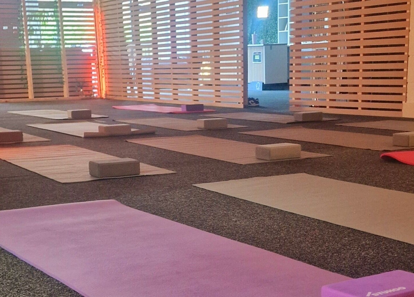 Yoga mats and blocks set up at Inner Peace Pathways, Stoke-on-Trent, England, GB for a calming session.