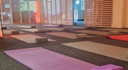 Yoga mats and blocks set up at Inner Peace Pathways, Stoke-on-Trent, England, GB for a calming session.