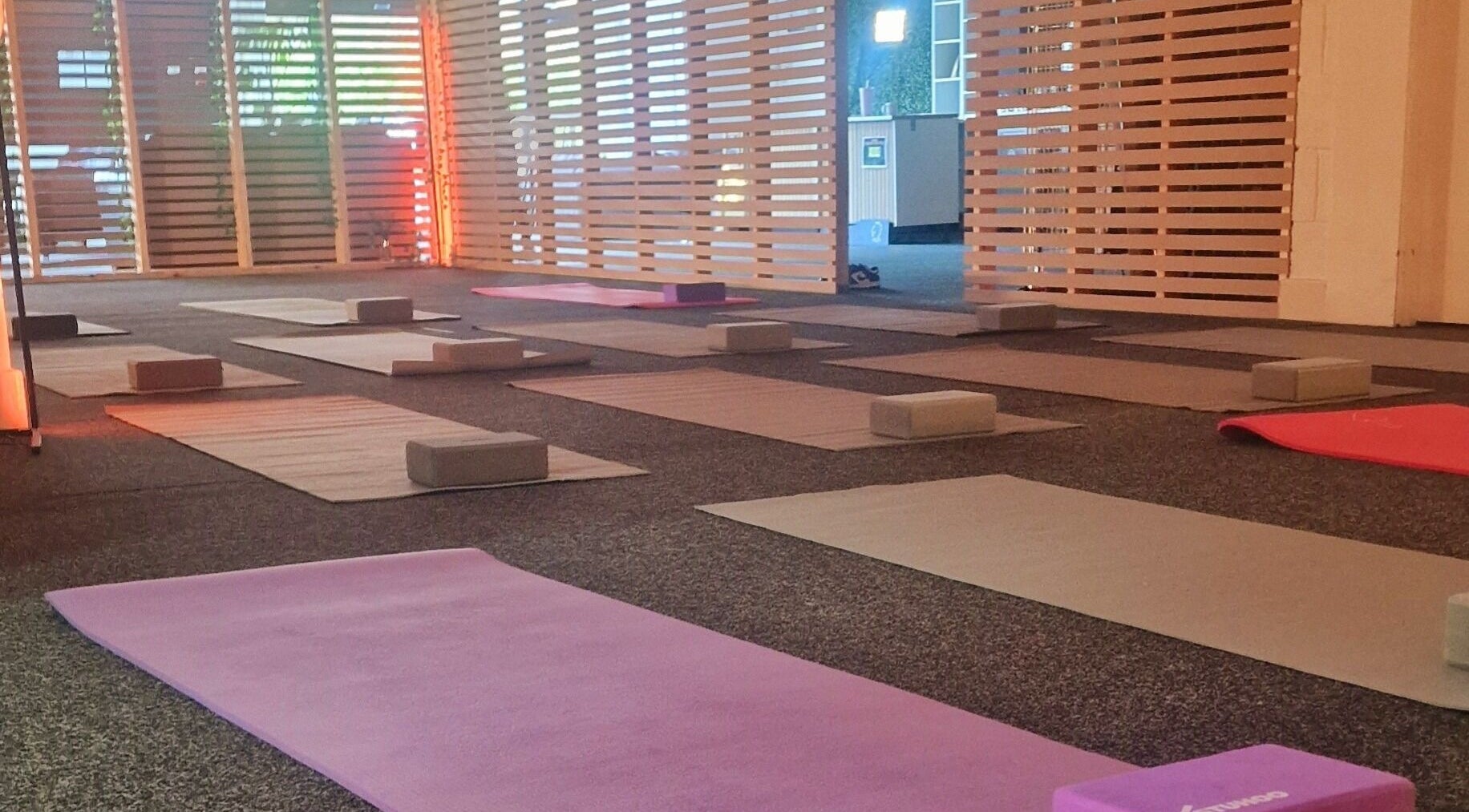 Yoga mats and blocks set up at Inner Peace Pathways, Stoke-on-Trent, England, GB for a calming session.